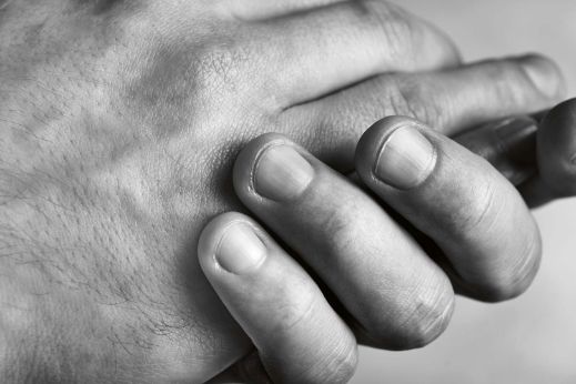 stories-people-employee-development-urs-studer-hands-stage